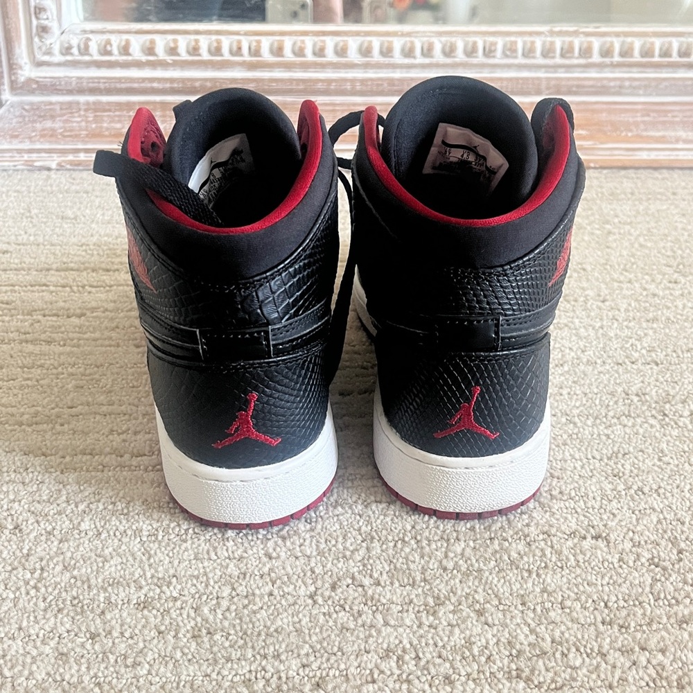 Jordan Kids Black and Red High-Top Sneakers, size 5Y